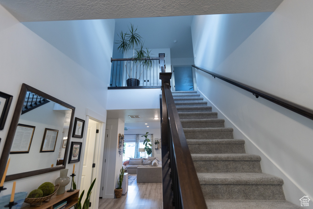 Stairway with wood finished floors