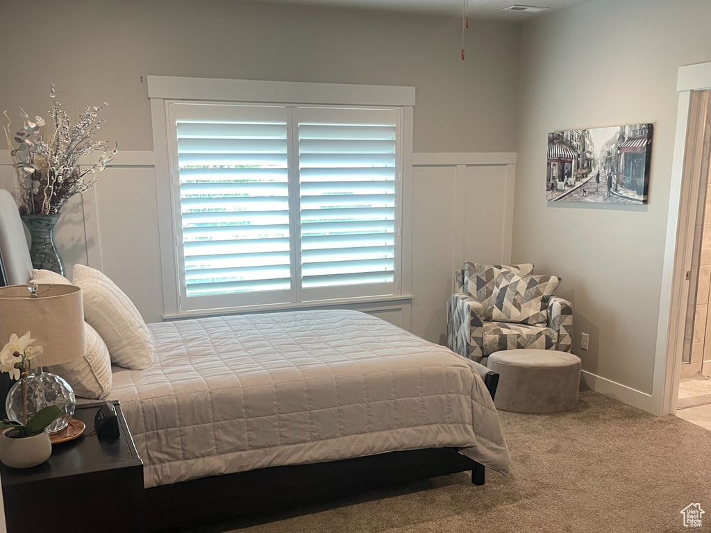 Bedroom featuring carpet flooring, ceiling fan, and baseboards