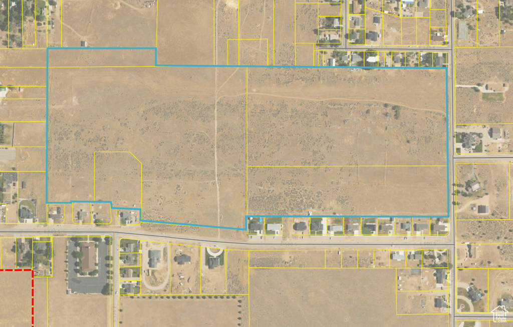 Aerial overview of property's location featuring property parcel outlined