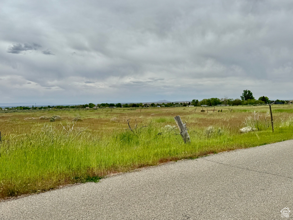 View of asphalt street with a view of countryside