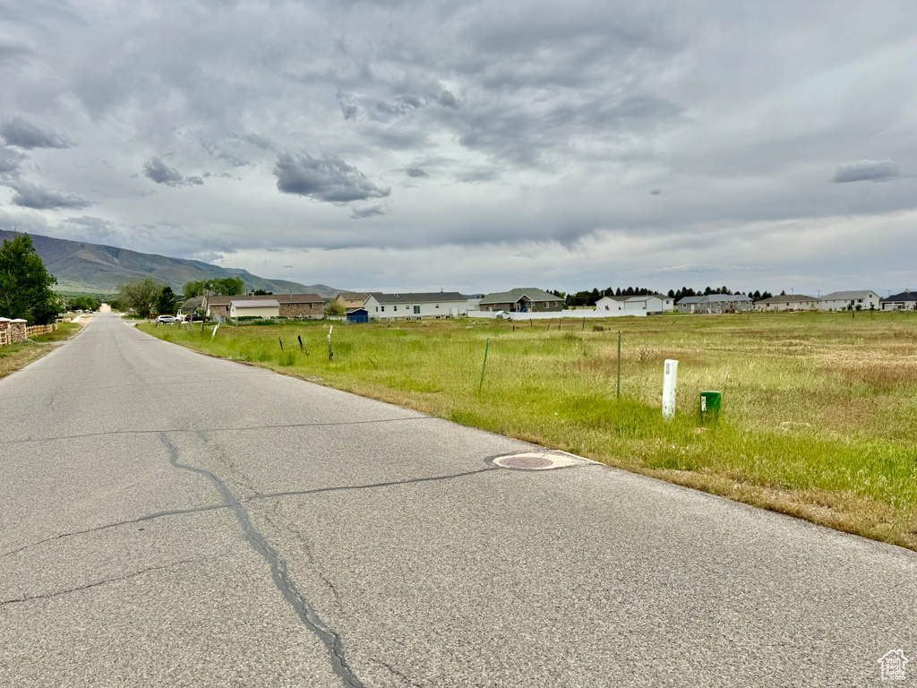View of asphalt road with a mountain view