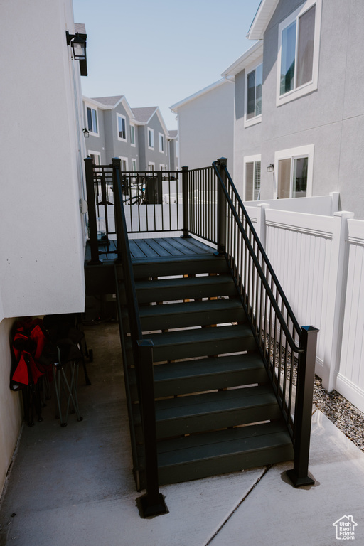 Deck featuring a residential view and stairs