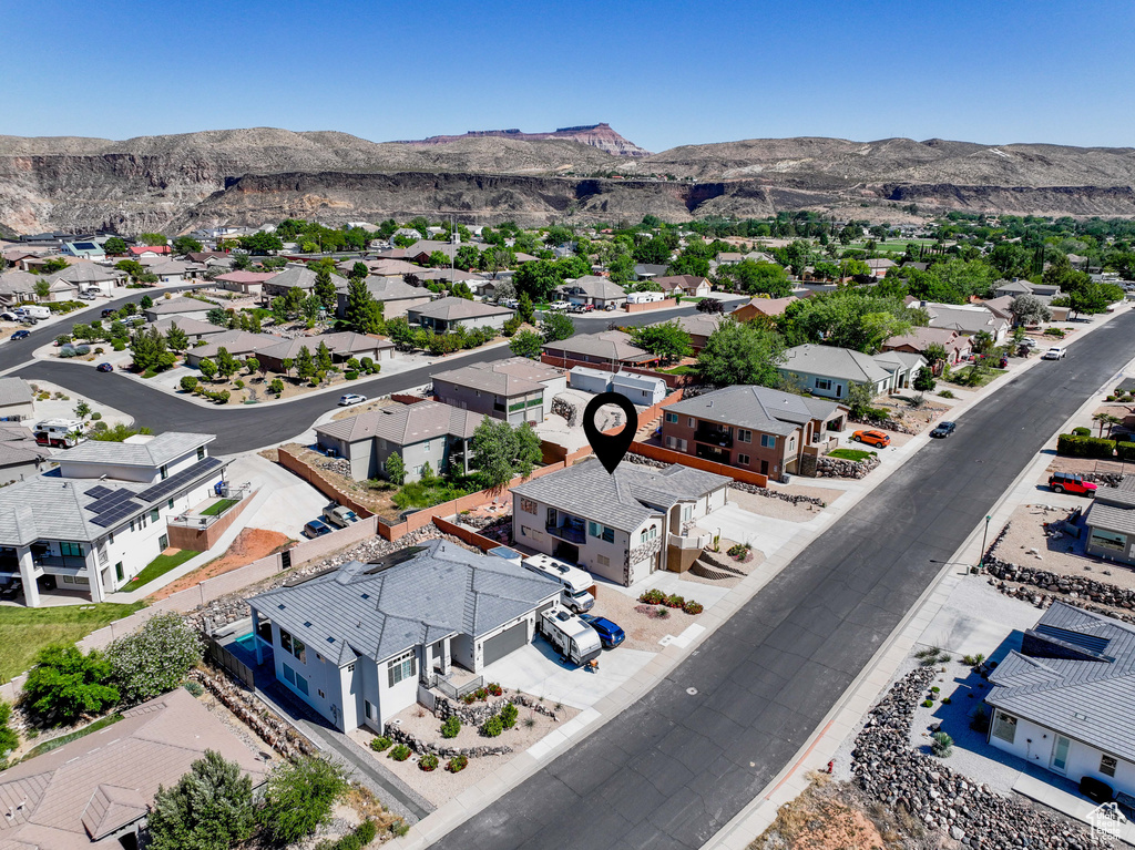 Aerial perspective of suburban area featuring mountains