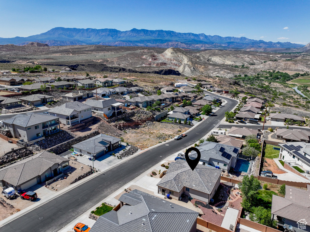 Aerial perspective of suburban area featuring mountains