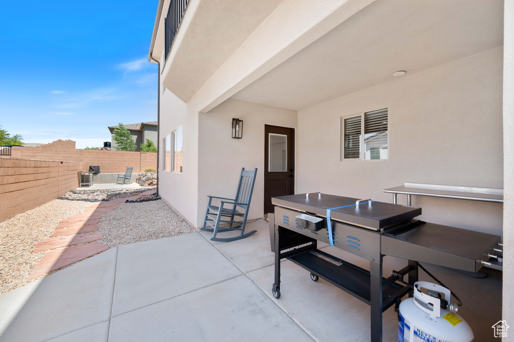 Fenced backyard featuring a patio area