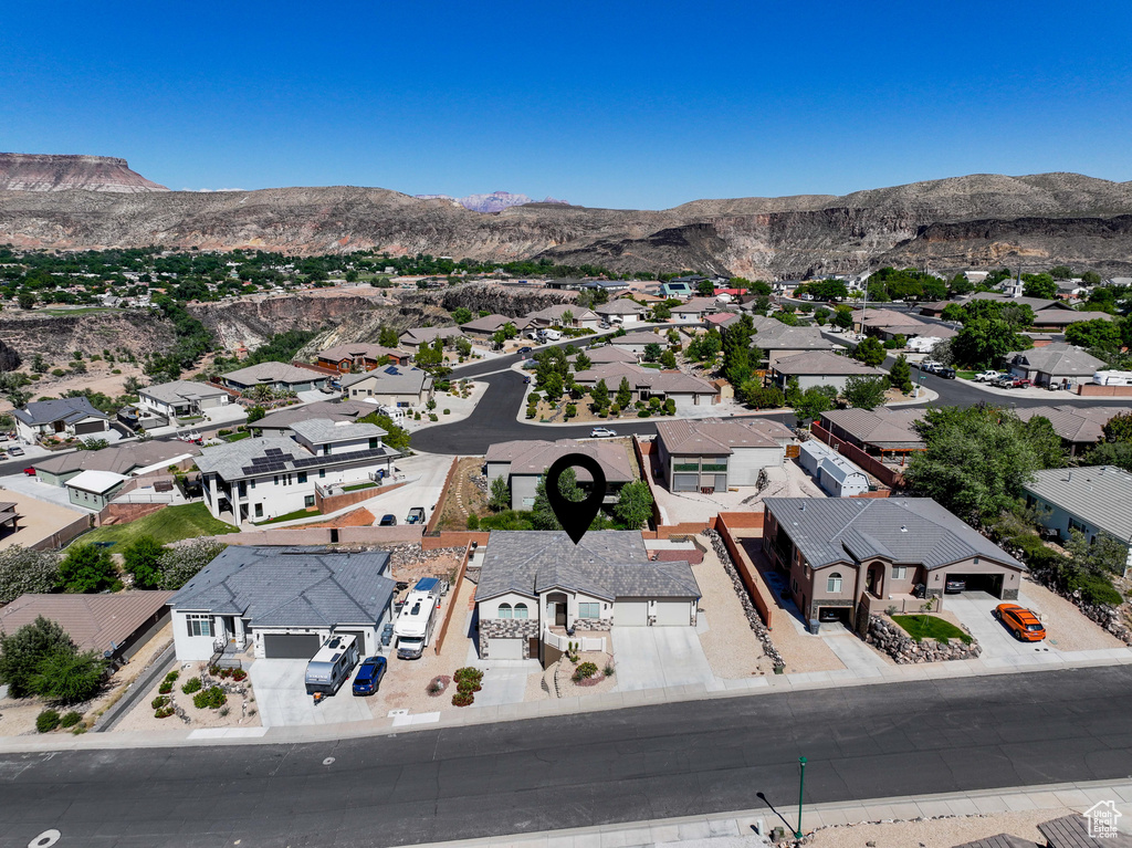 Aerial perspective of suburban area with mountains