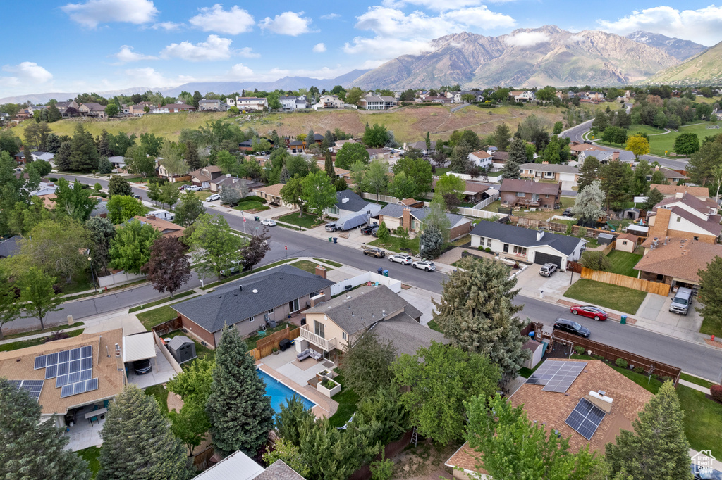 Aerial view of residential area with a mountain backdrop