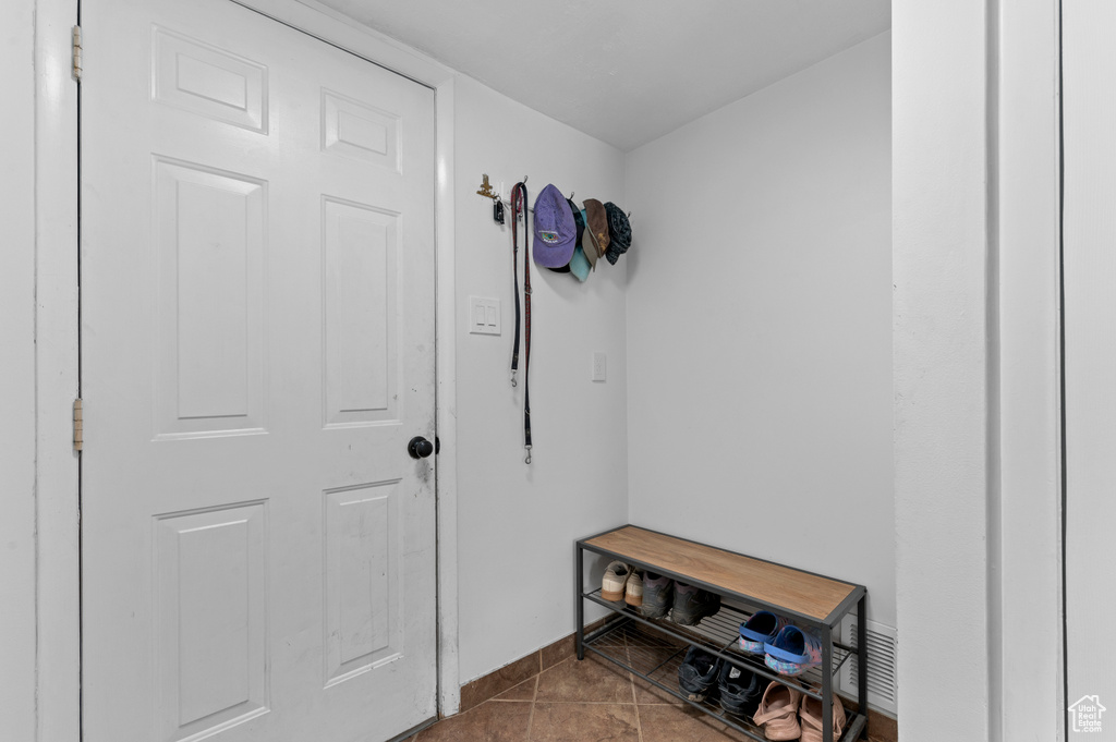 Mudroom featuring baseboards