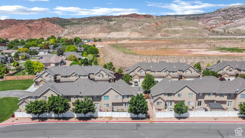 Aerial view of residential area with a mountain backdrop