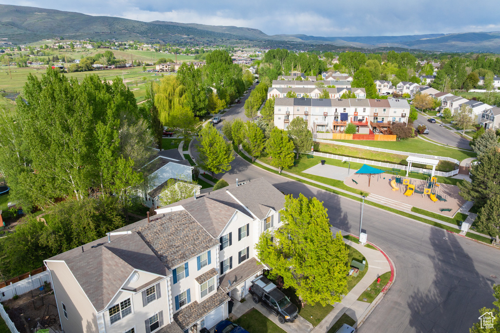 Aerial view of residential area with a mountain backdrop
