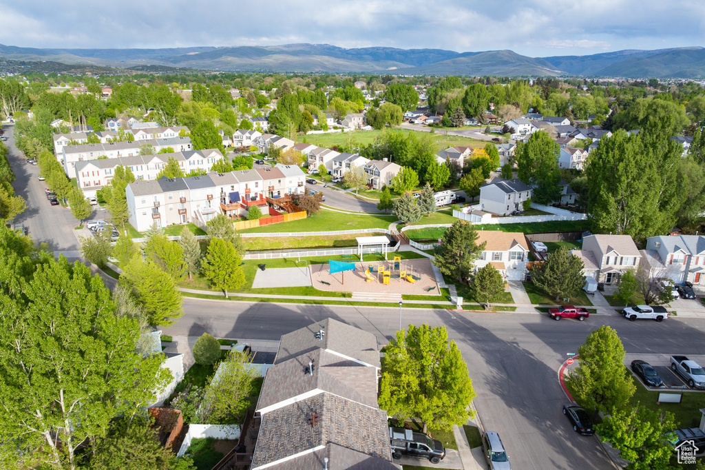 Aerial view of residential area featuring mountains