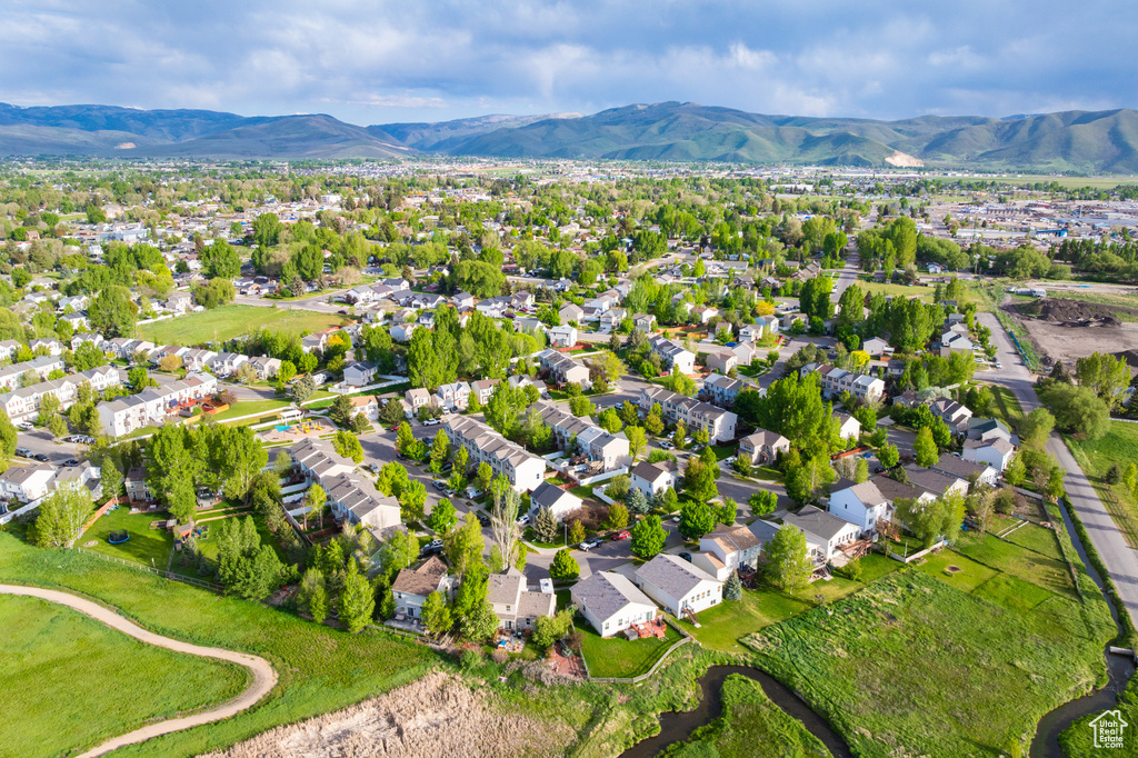 Aerial view of residential area featuring mountains