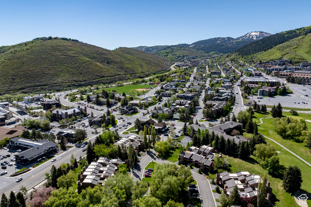 Aerial view of residential area with a mountain backdrop