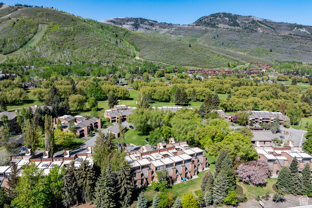 Aerial view of residential area featuring mountains