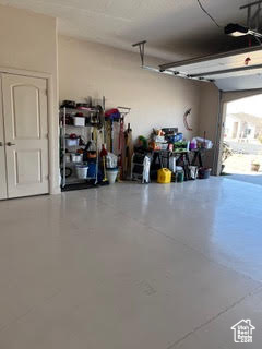 Garage featuring a garage door opener