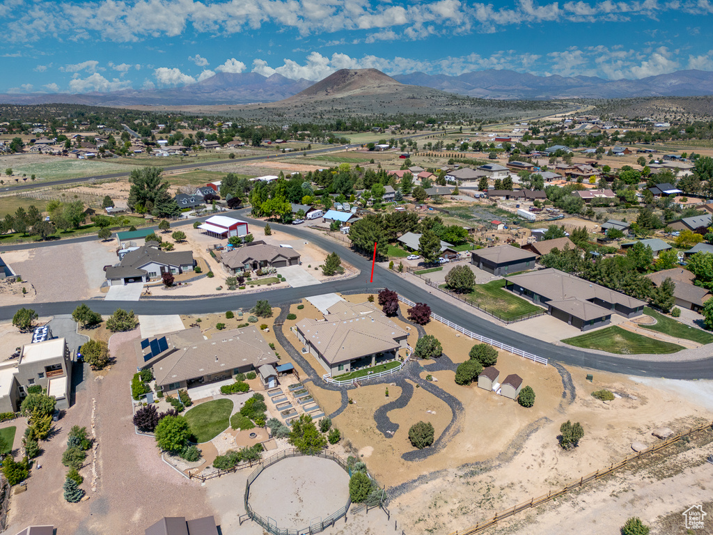 Aerial perspective of suburban area with a mountain backdrop