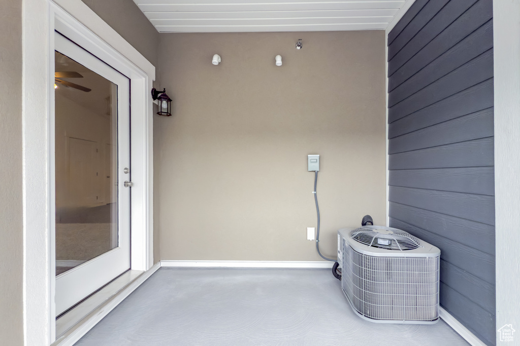View of patio with central AC unit