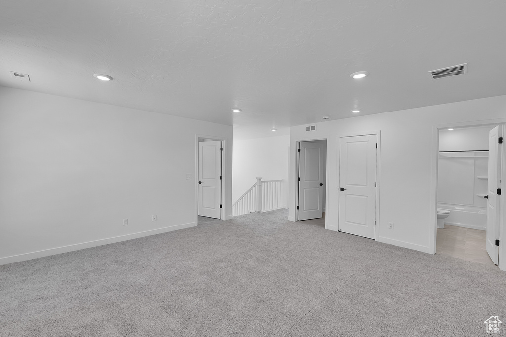 Below grade area featuring recessed lighting, carpet, and baseboards