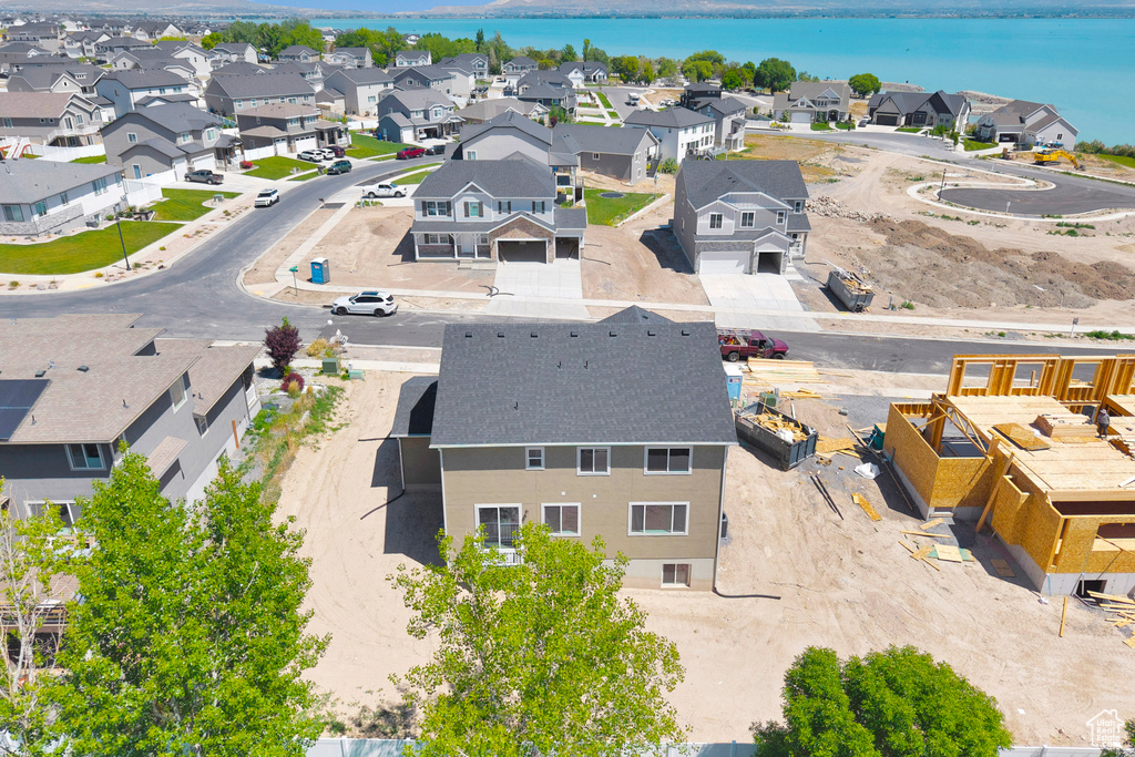 Aerial view of residential area with a large body of water
