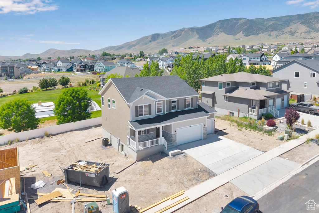 Aerial perspective of suburban area featuring mountains