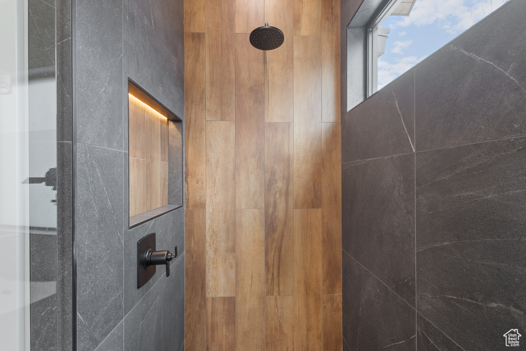 Bathroom view of a tile shower