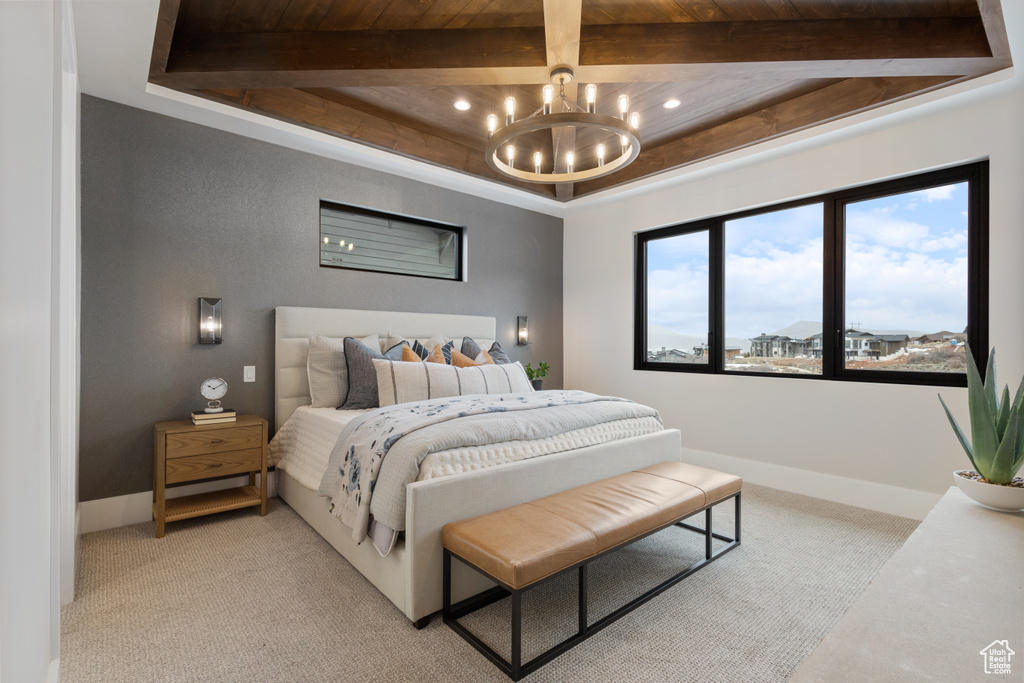 Bedroom with light carpet, a chandelier, beam ceiling, baseboards, and recessed lighting