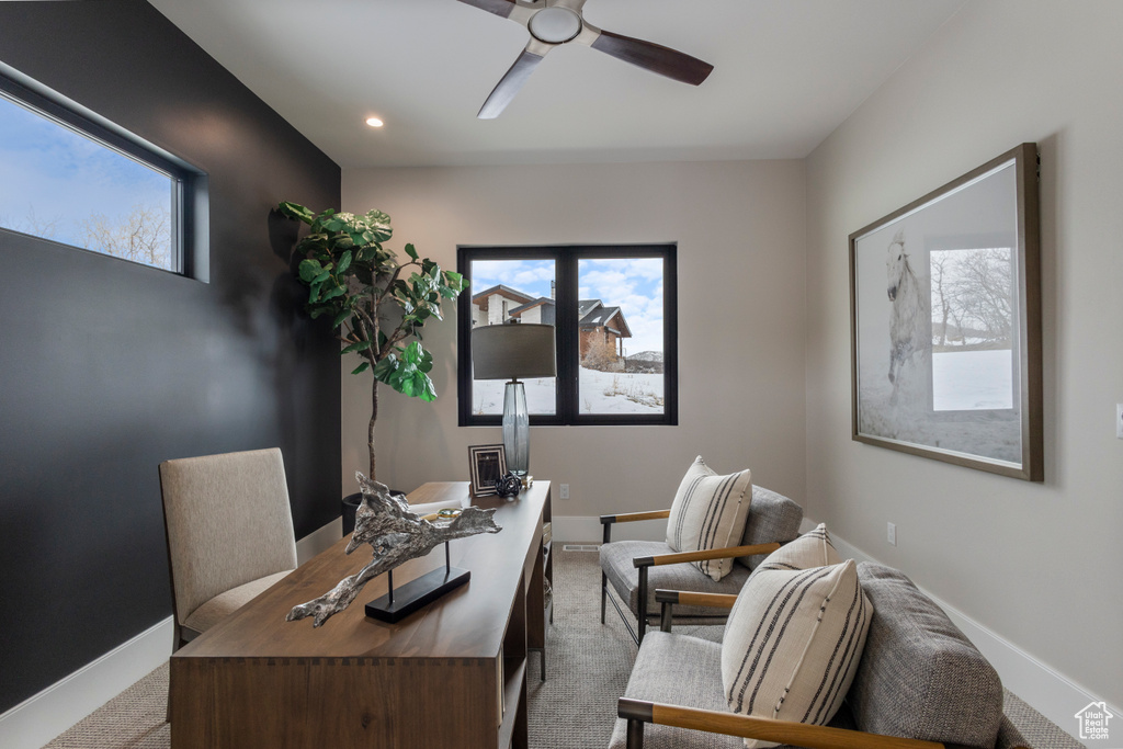 Carpeted home office with a ceiling fan, baseboards, and recessed lighting