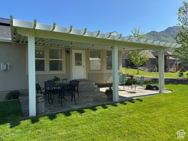 View of patio / terrace with a mountain view