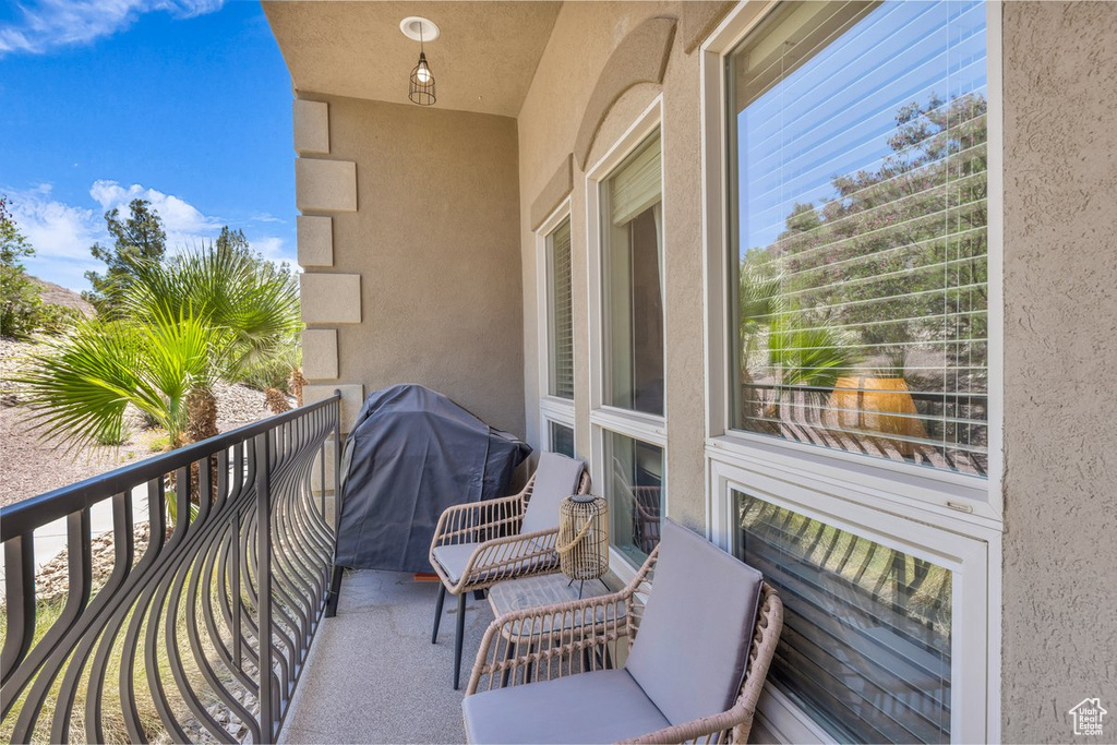 Balcony featuring area for grilling