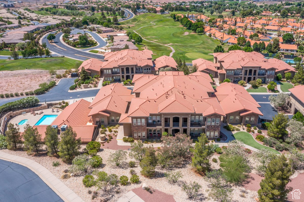 Aerial view of a pool area and a golf club