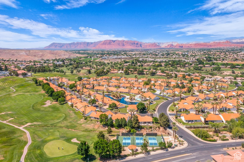 View of property location with nearby suburban area, mountains, and a local golf course