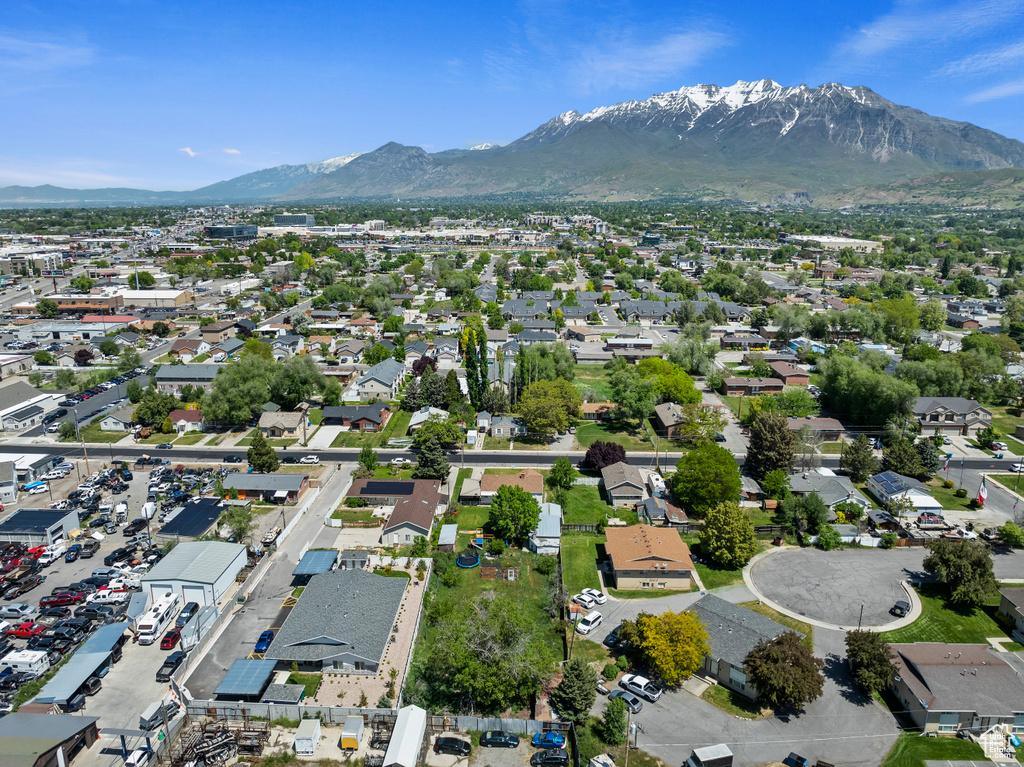 Aerial view of residential area featuring mountains