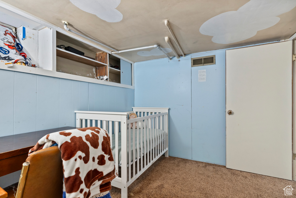 View of carpeted bedroom