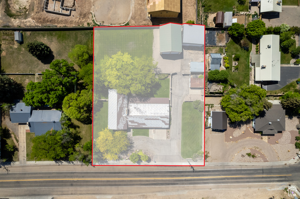 Aerial overview of property\\\'s location featuring property parcel outlined