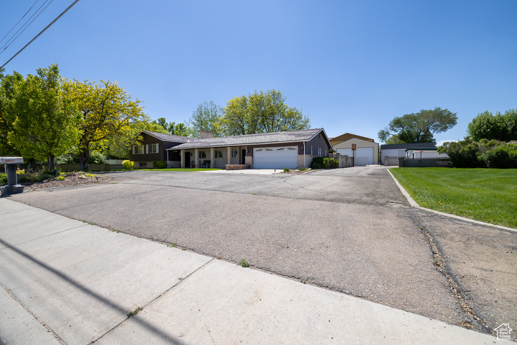 Ranch-style home with a chimney