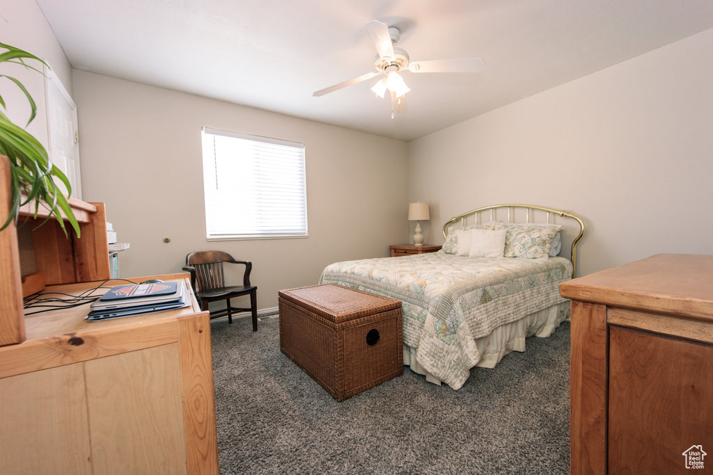 Bedroom featuring carpet floors and ceiling fan