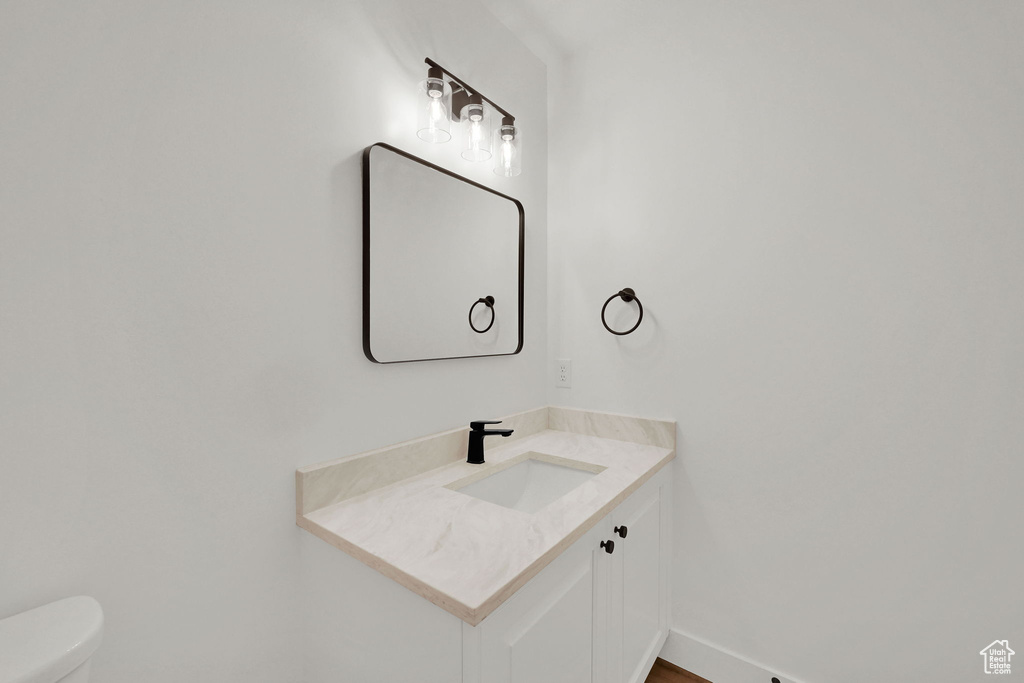 Bathroom with vanity and toilet