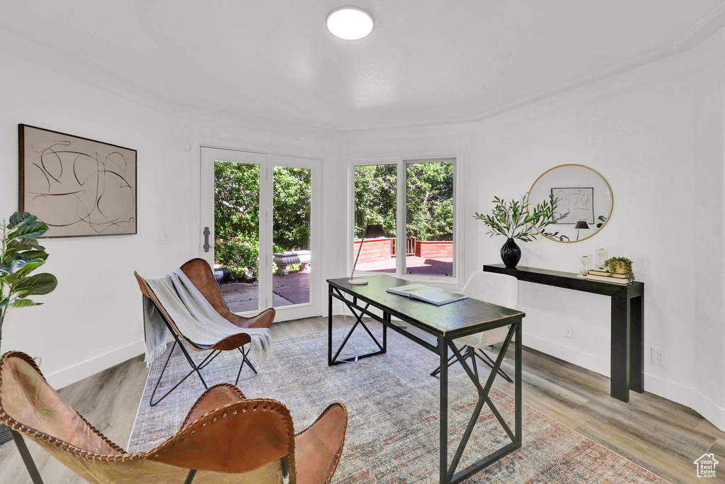 Office area featuring light wood finished floors and baseboards
