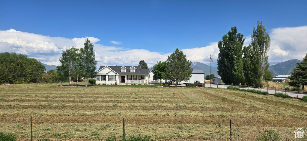 View of front facade featuring a rural view and a mountain view