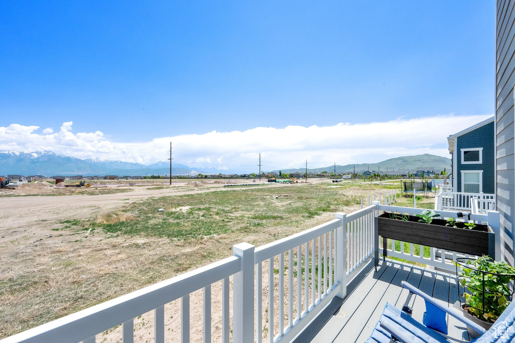 Balcony with a mountain view and a rural view
