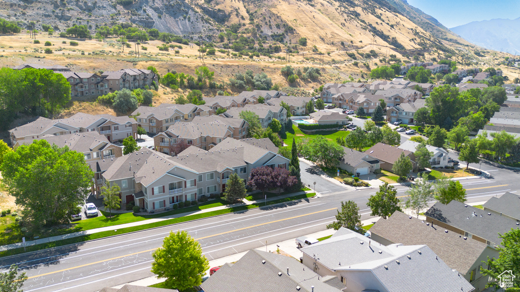 Aerial view of residential area with a mountain backdrop