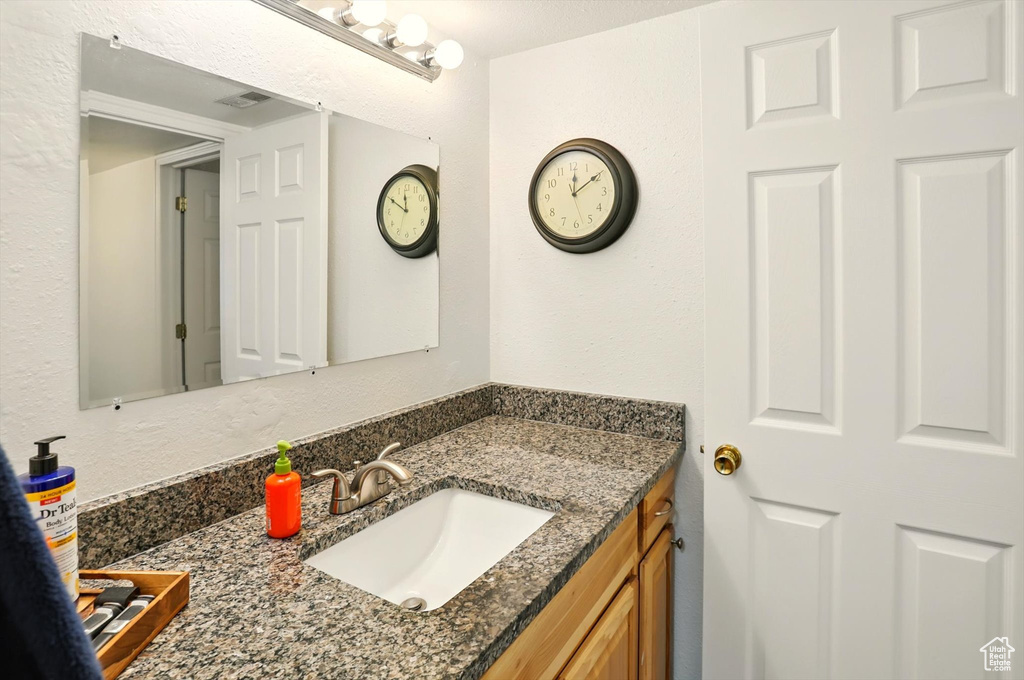 Bathroom featuring vanity