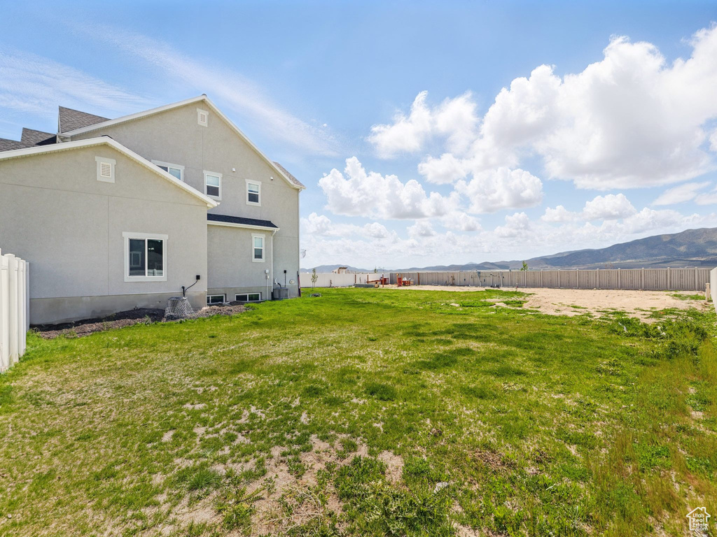 View of yard with a mountain view