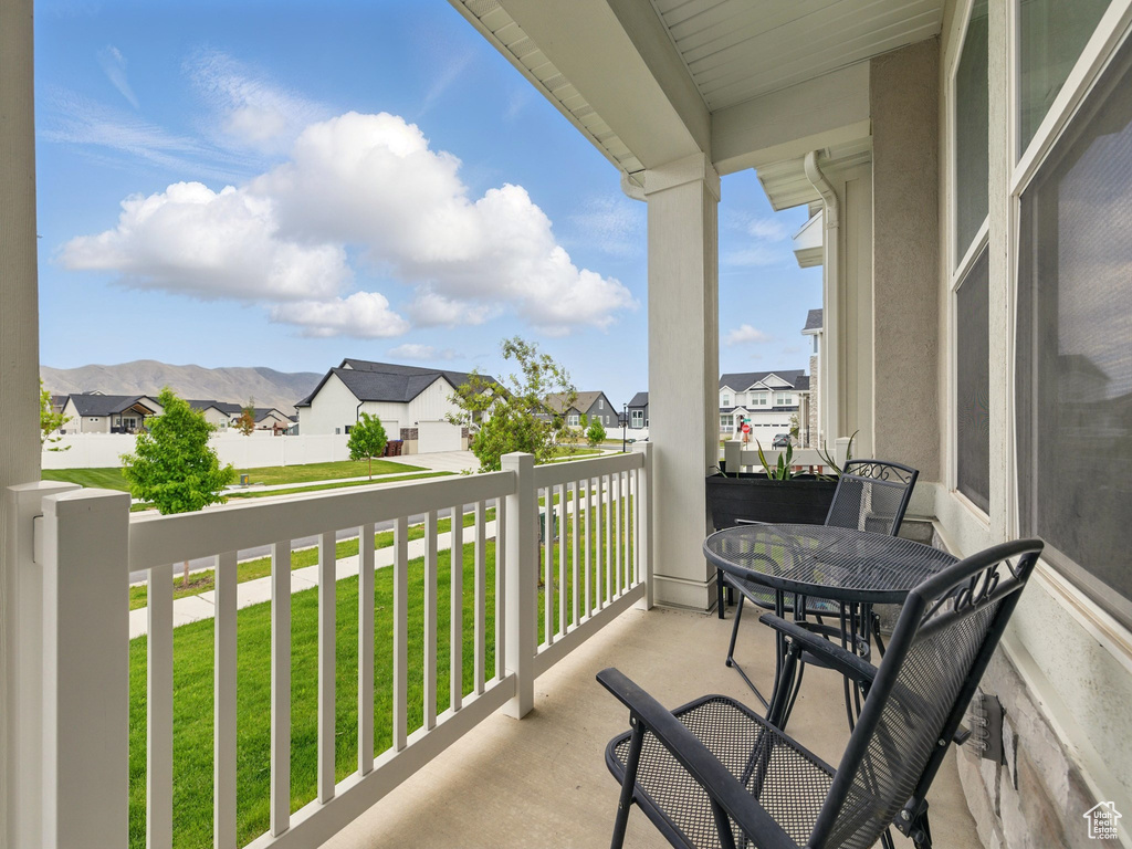 Balcony featuring a residential view