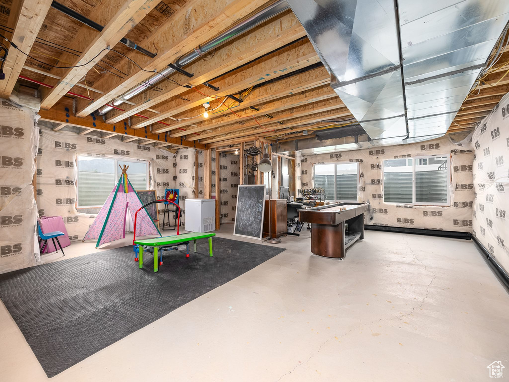 Below grade area featuring plenty of natural light