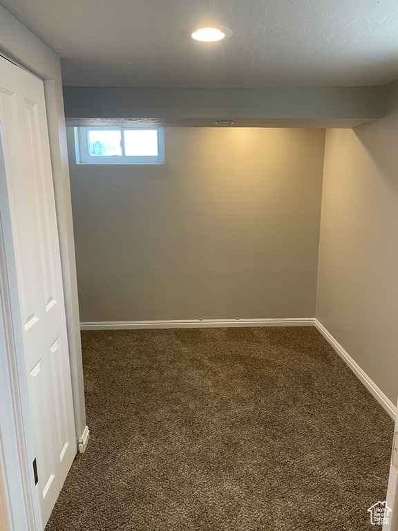 Basement featuring carpet floors, baseboards, and recessed lighting