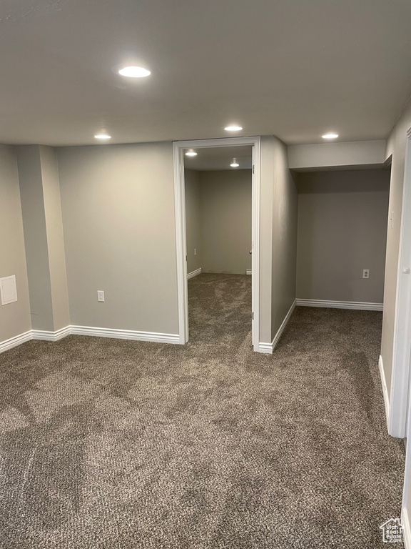 Basement with carpet flooring, recessed lighting, and baseboards