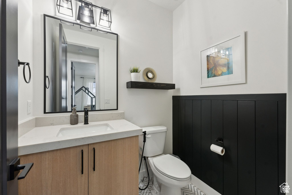 Half bath with toilet and vanity