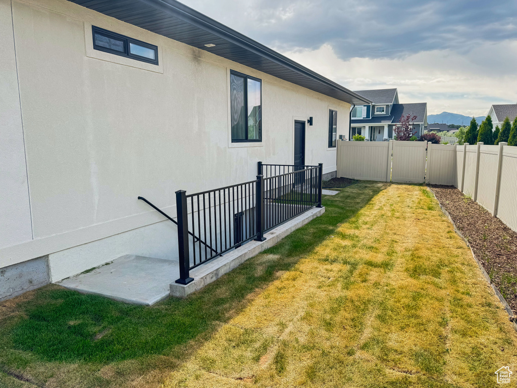 View of fenced backyard