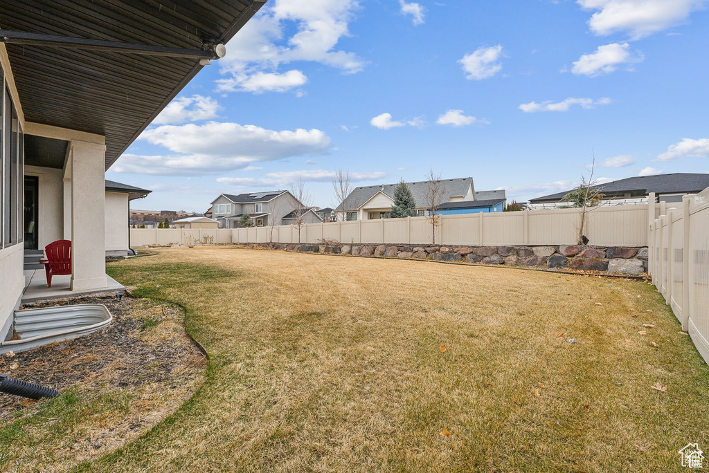 View of yard featuring a residential view